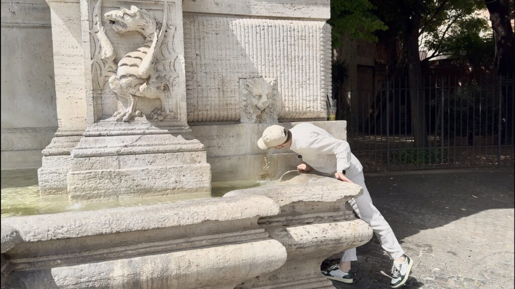 Fountain in Piazza Trilussa, Trastevere, on a summer day