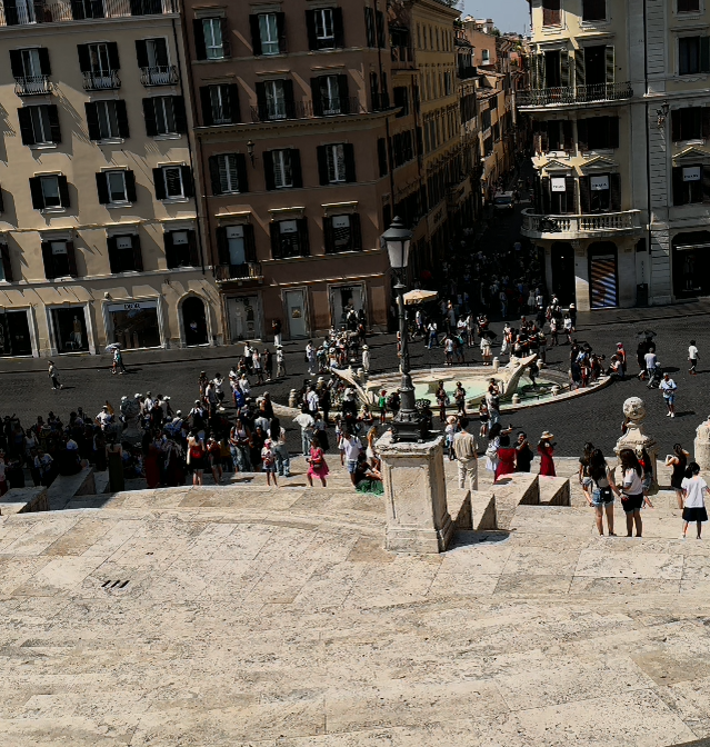 Crowds on Via Condotti seen from the top of the Spanish Steps