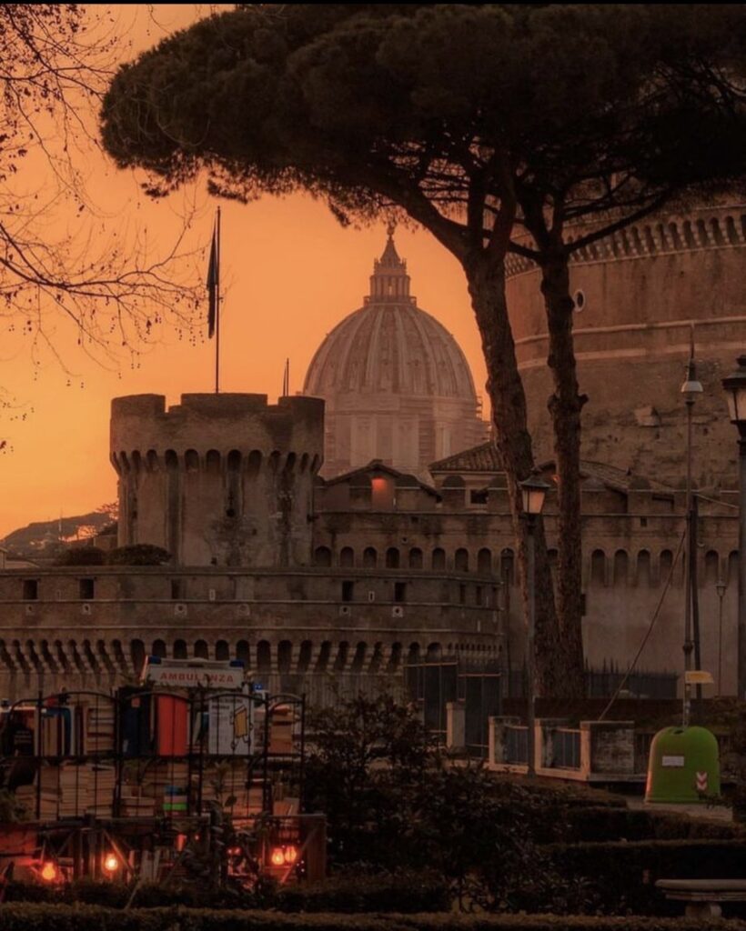 Castel Sant'Angelo and St. Peter's dome in golden October light