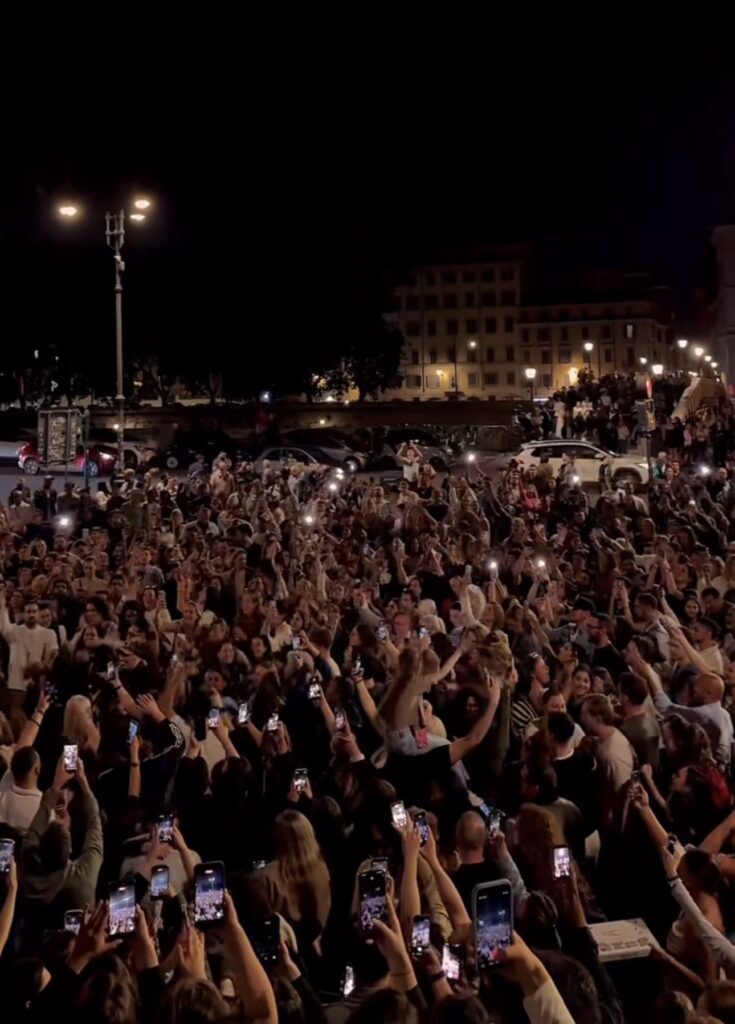 Crowds celebrating at night in Piazza Trilussa, Trastevere