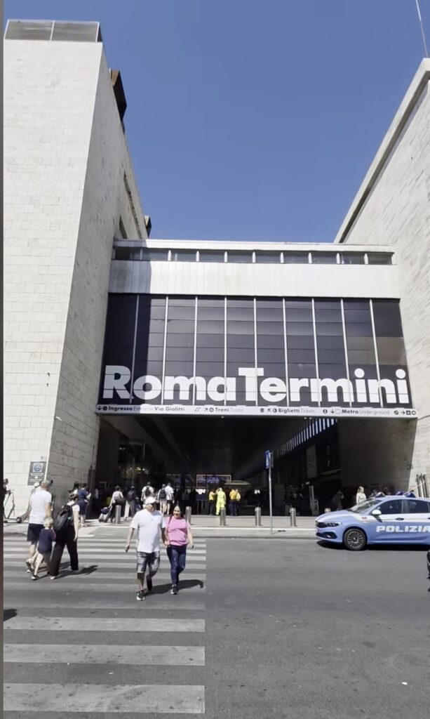 Police car outside Roma Termini station during the day